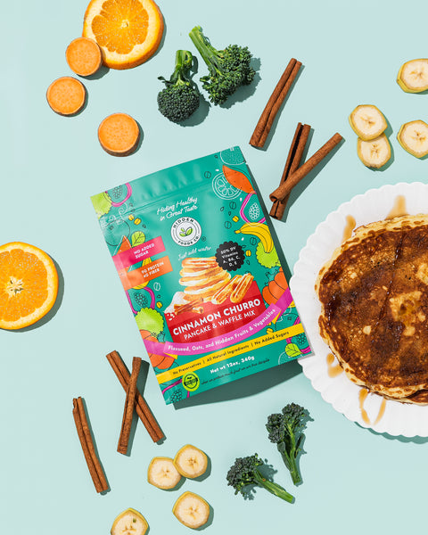 Cinnamon Churro pancake mix package with ingredients on a light blue background