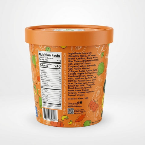 A single cup of mac and cheese shown from the back, featuring an orange lid and an orange label decorated with illustrations of pumpkins, gourds, and seasonal fruits. The back of the tub displays the Nutrition Facts label, ingredients list, and barcode against a clean white background.